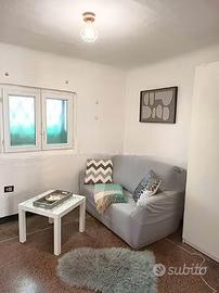 Quezzi bilocale con giardino privato e garage