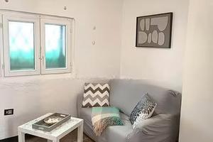 Quezzi bilocale con giardino privato e garage