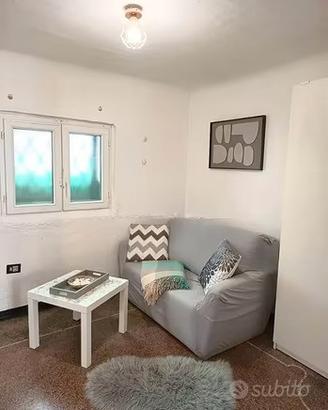 Quezzi bilocale con giardino privato e garage