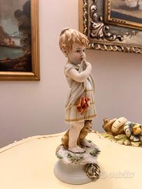 bambina con gattino Triade Bennacchio 