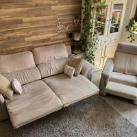 Divano e poltrona con sistema relax