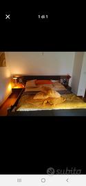 letto con cassapanca e comodini incorporati