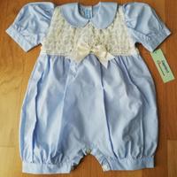 Pagliaccetto celeste neonata in cotone