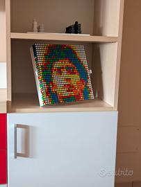 Ritratto Maradona in stile pixel art Ribik