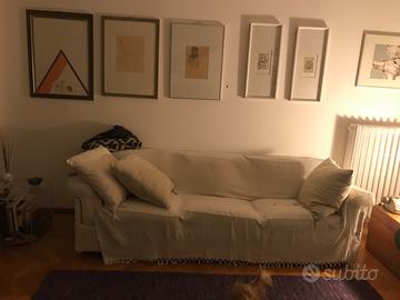 Divano 3 posti in tessuto tavolo ovale bianco