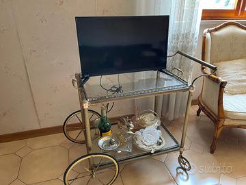 Carrello in ottone porta vivande