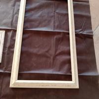 tre cornici in legno 