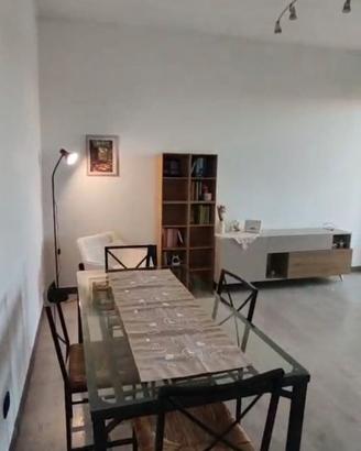 Tavolo in vetro e sedie