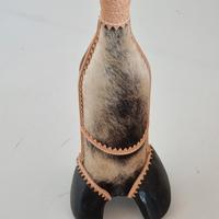 bottiglia a forma di zoccolo