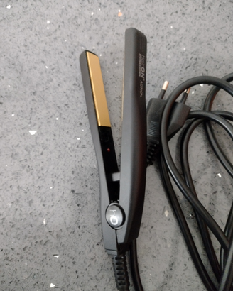 Piastra x capelli da viaggio Hairon action