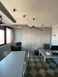 Stanza singola in studio condiviso