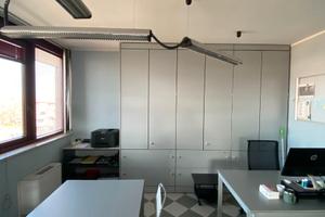 Stanza singola in studio condiviso