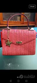 borsa rosso corallo di pelle paglia firmata 