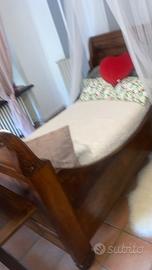 Letto a barca in legno messello