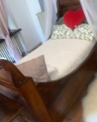 Letto a barca in legno messello