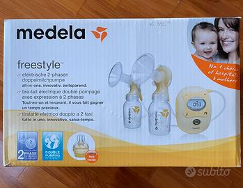 Medela tiralatte elettronico doppio Freestyle+bibe