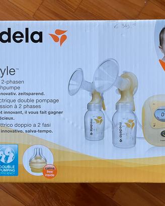 Medela tiralatte elettronico doppio Freestyle+bibe