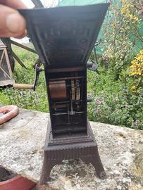 Girarrosto in ghisa antico