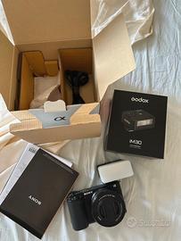 Sony Alpha nero ZV-e10 con flash godox memo 256gb