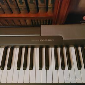 pianola Casio con sostegno