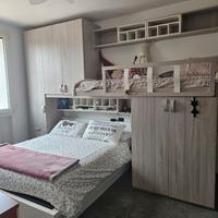 Camera a ponte con due posti letto