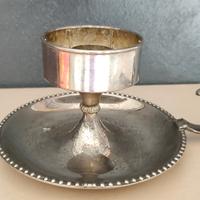 Bugia porta candela in metallo argentato