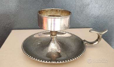 Bugia porta candela in metallo argentato