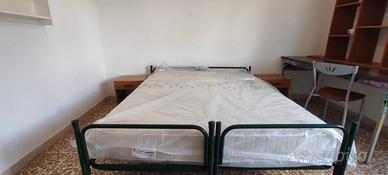 Camere in ampio e luminoso appartamento