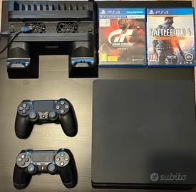 PS4 slim 1T + 2 controller + base ric + 2 giochi