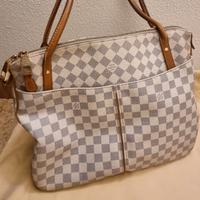 Borsa e portafoglio Louis Vuitton