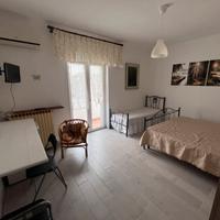 Camera Grande con bagno e balcone
