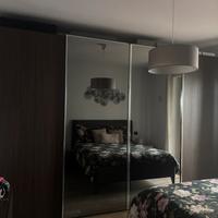 Armadio 4 ante scorrevoli con specchi centrali