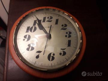 Orologio da parete anni 70 in legno SAYS WATCH
