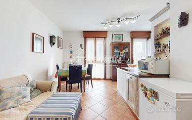 Luminoso Attico con Due Terrazzi e Garage a Rubier