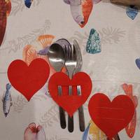 Tre porta posate a forma di cuore