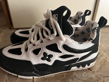 Sneakers uomo/donna bicolare bianco e nero.