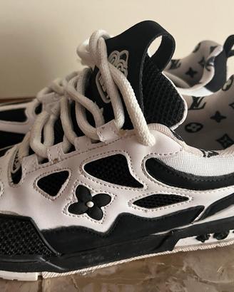Sneakers uomo/donna bicolare bianco e nero.