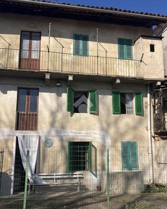 CASA SEMINDIPENDENTE A STRONA