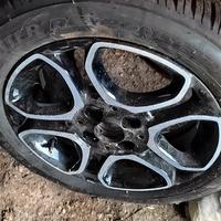 Cerchi con gomme nuove 165/65/15