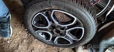 Cerchi con gomme nuove 165/65/15
