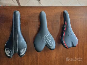 sella mtb. Lotto di 3 sellini + manopole progrip