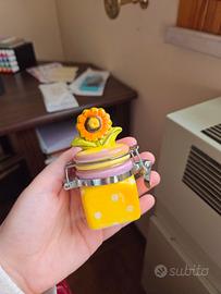 Barattolino in ceramica con girasole