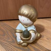 Porta camdela a forma di angioletto