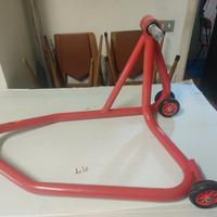 Cavalletto posteriore per moto con monobraccio.