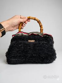 Borsa Artigianale  pelliccia con manico in bambù