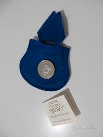 medaglie, sorpresine Kinder, tessere telefono