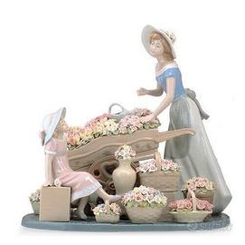 La venditrice di fiori al mercato