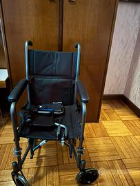 Sedia a rotelle pieghevole