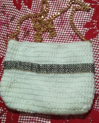 Borse di filo fatti a uncinetto di vari colori .