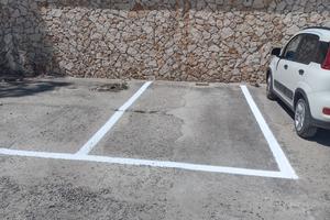 Posti auto scoperti in area cortilizia - via Koch